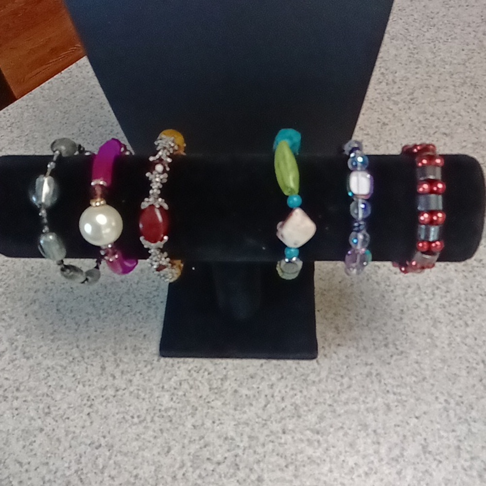 257. SIX STRETCH BRACELETS ALL TOGETHER